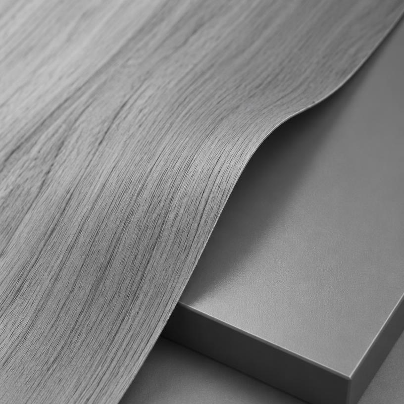 Thin wood veneer over a smooth coated panel